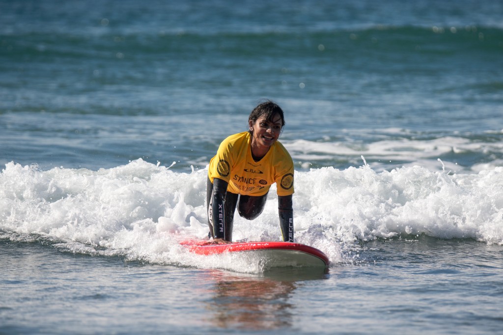 Hard not to smile while riding a wave. Photo: ISA / Sean Evans