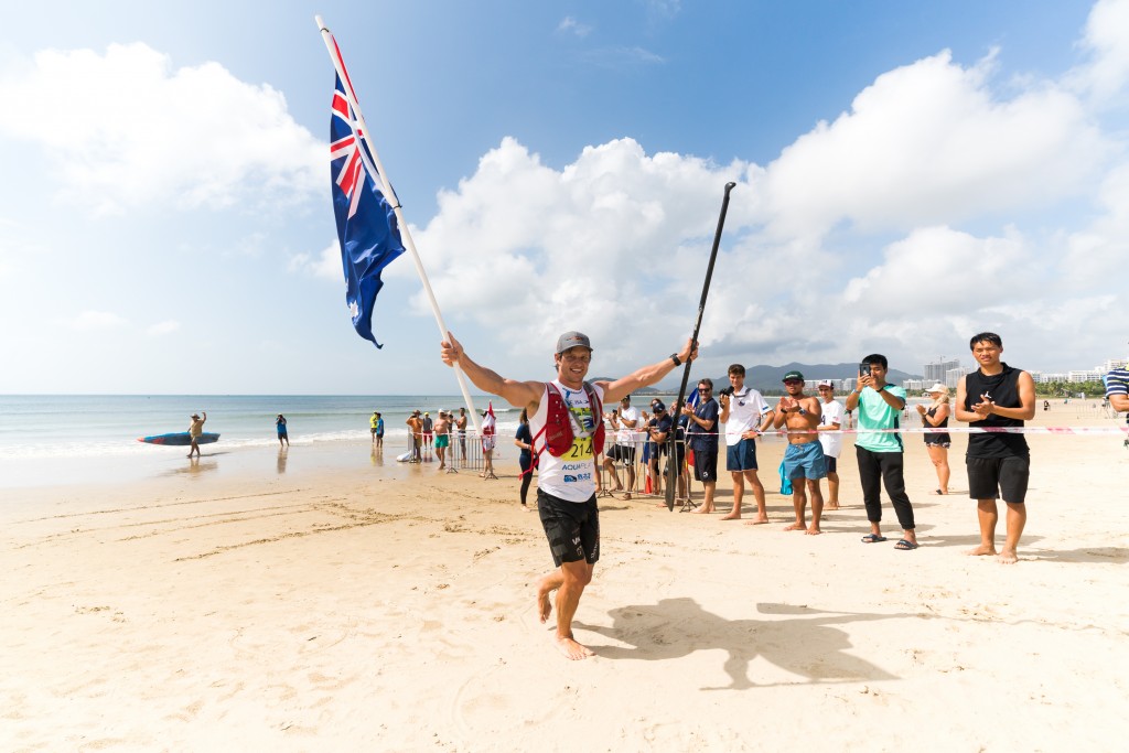 Michael Booth regains his ISA SUP Distance Title Gold Medal that he won in 2016. Photo: ISA / Sean Evans 