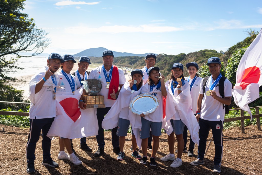 Team Japan puts their Gold Medals on display after taking the Team Title at the 2018 ISA World Surfing Games in Tahara, Japan. Photo: ISA / Sean Evans 